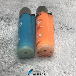 Mecheros Clipper color azul y naranja omg excellent emociones fabricados en España.