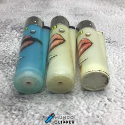 Three non-carbonated Clipper lighters, two refillable and one non-lipstick with piercings made in Spain.